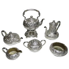 Geo C. Shreve & Co. a Finely Chased Six Piece Sterling Silver Tea and Coffee Set
