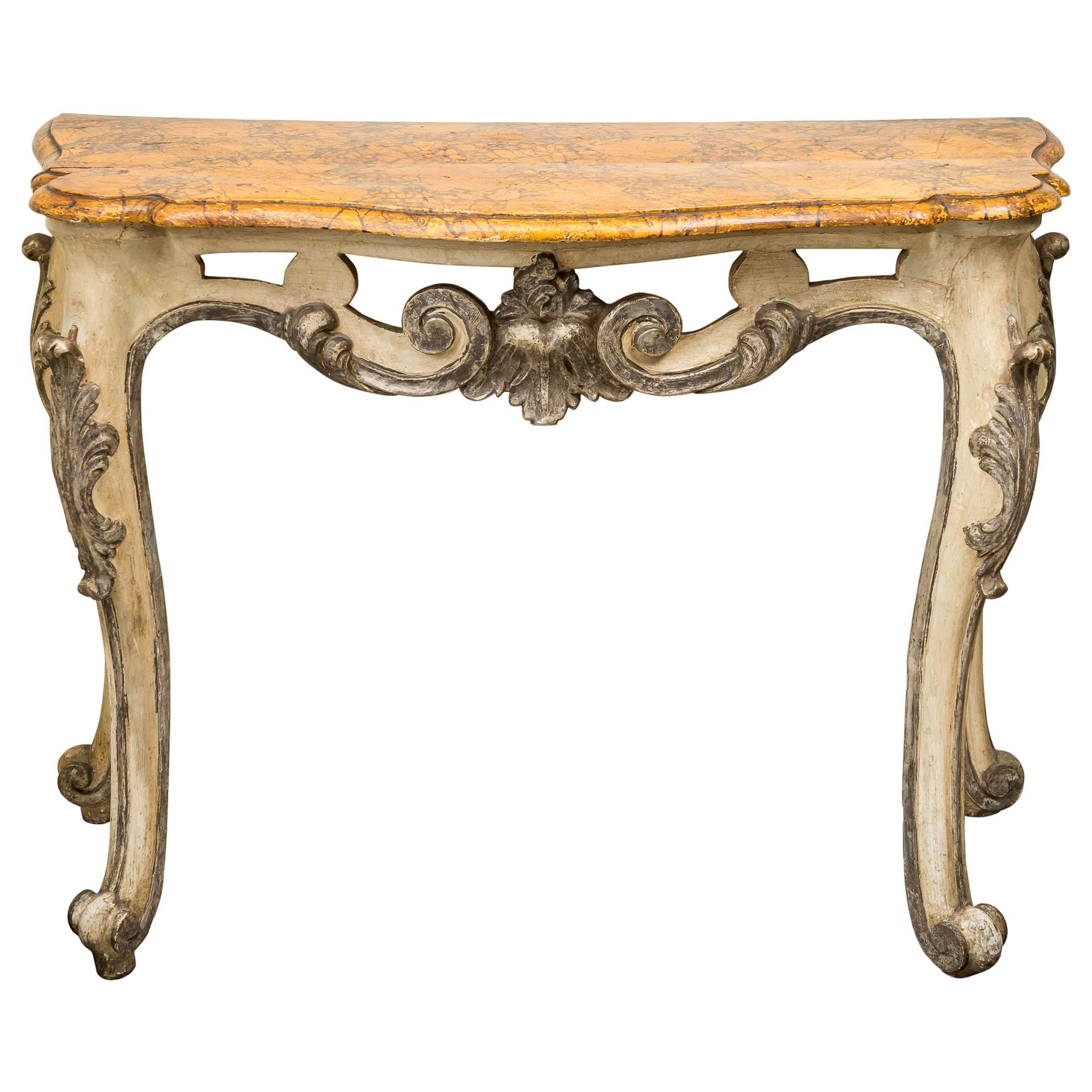 Console italienne du 18ème siècle en bois sculpté, peinture et argent doré, datant d'environ 1775