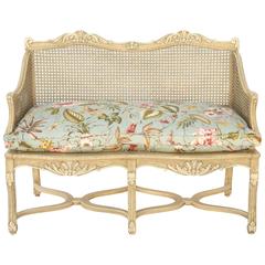 Antique Painted Caned Regence Style Closed Arm Settee