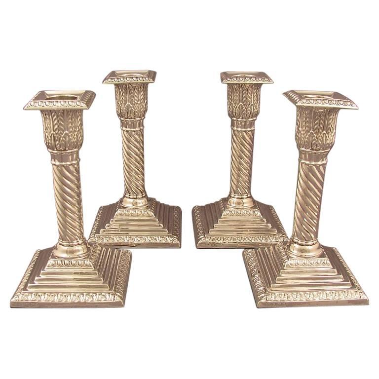 Set of Four Sterling Silver Candlesticks For Sale