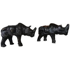 Vintage Rare and Small Pair of Black Rhino Sculptures Leather on Wood with Glass Eyes