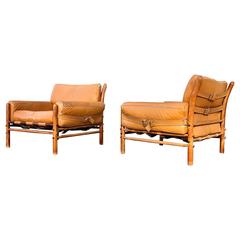 Pair of Leather and Teak "Kontiki" Lounge Chairs by Arne Norell