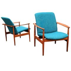 Pair of Sculpted Teak Lounge Chairs