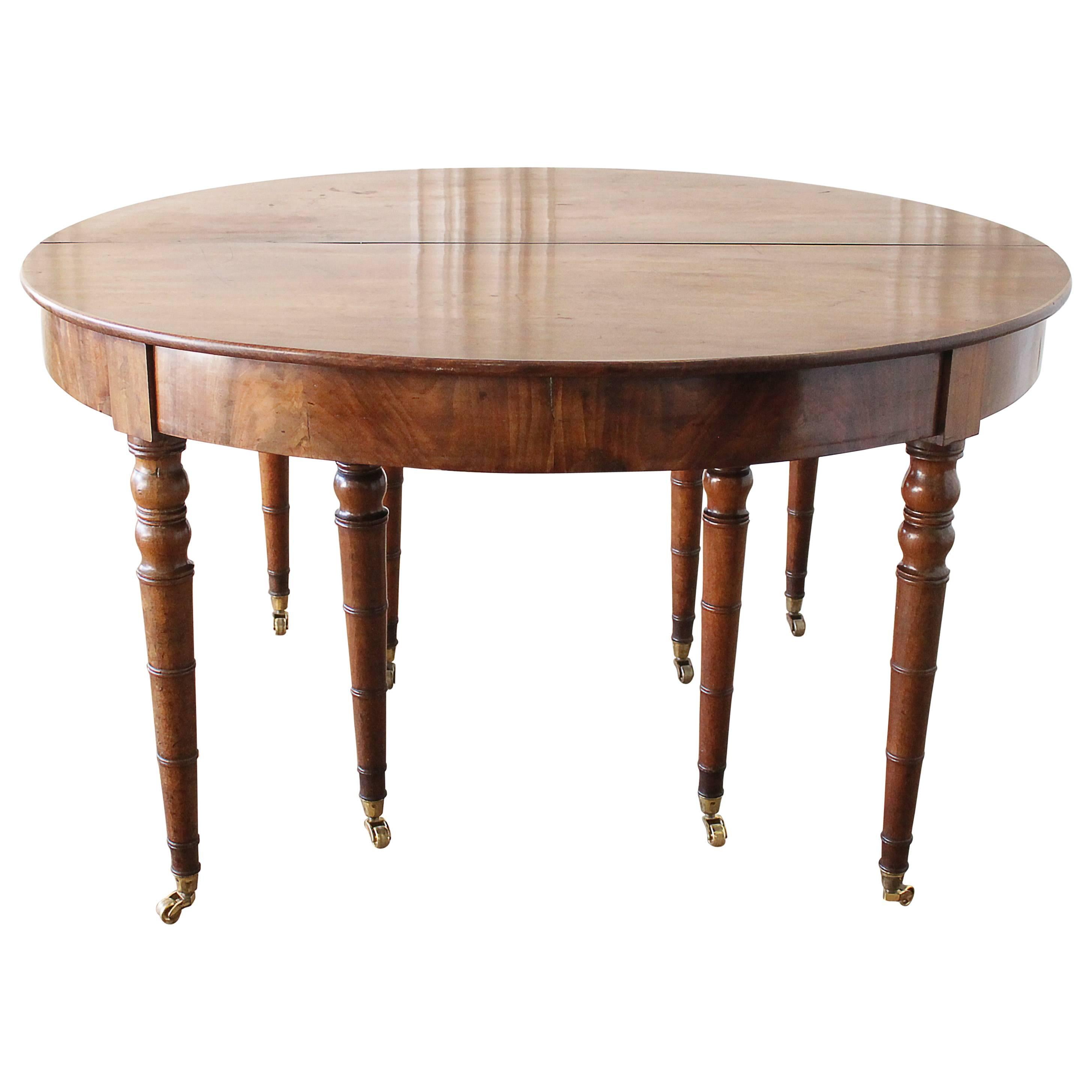 Early 19th Century Dining or Entry Table with eight Legs and Caster Wheels