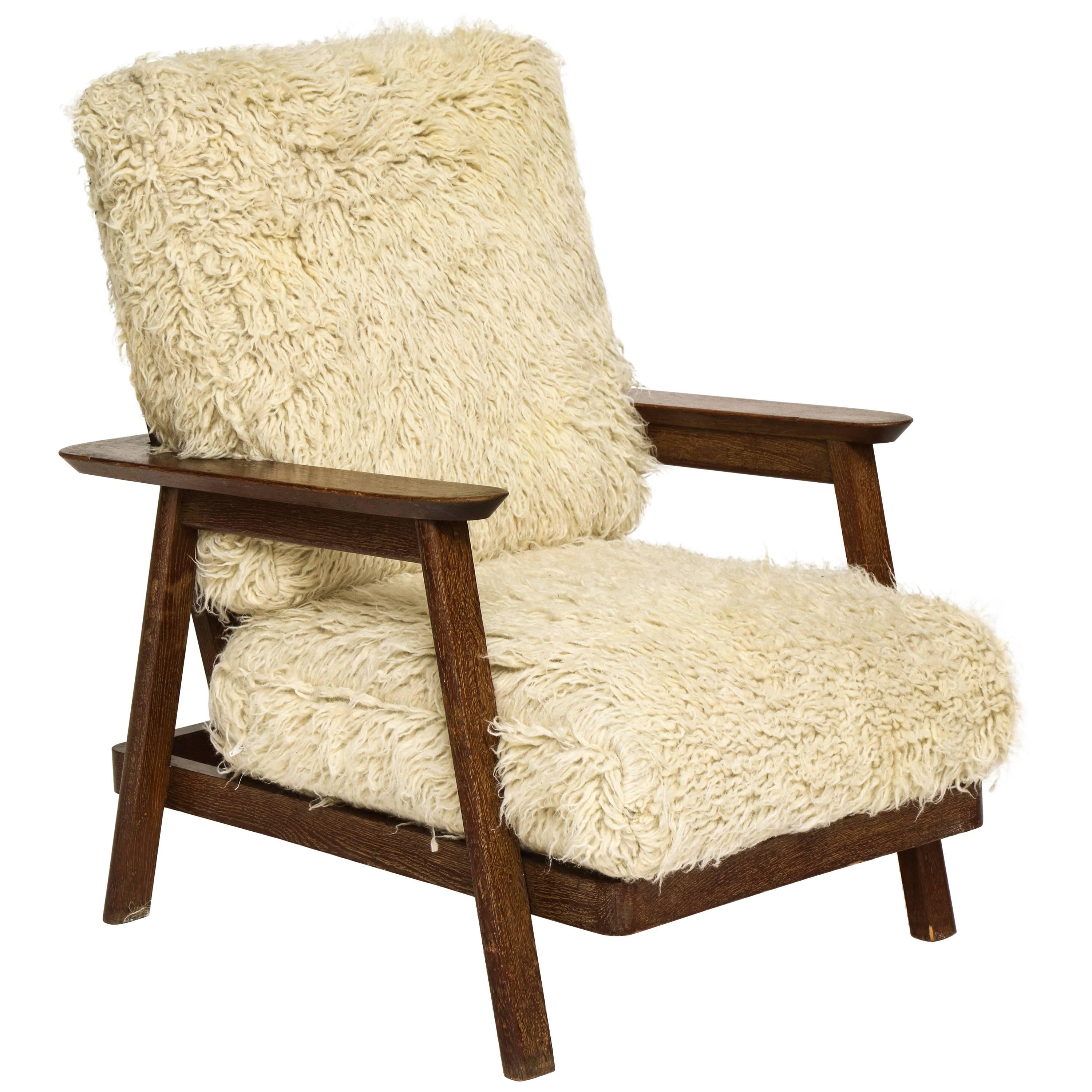 Attributed to Rene Gabriel cerused oak lounge chair Mid-Century, France, 1950.

Early 1950s example of Rene Gabriel early lounge chair. Folds down. Covered in white wool. 

Measures: 36 high,
35 deep,
27 wide.