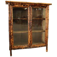 Antique Bamboo Glass Front Cabinet