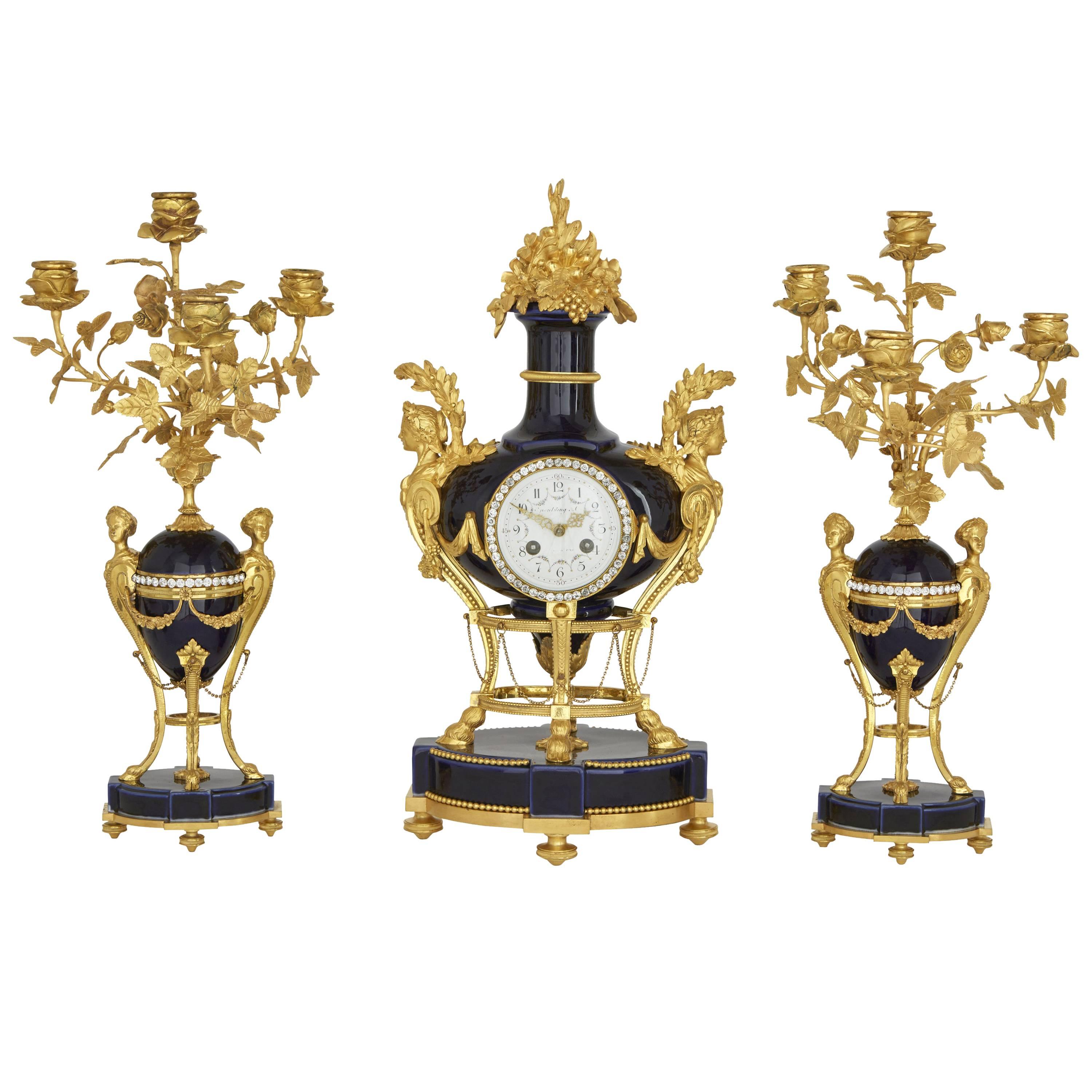 Ormolu Mounted Dark Blue Porcelain Three Piece Clock Set by Spaulding & Co.