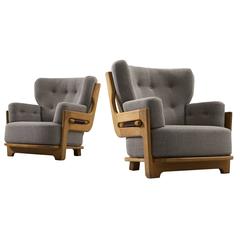 Guillerme & Chambron Set of Two Lounge Chairs in Solid Oak and Grey Upholstery 