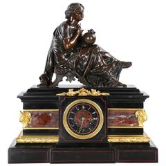 Used J.E. Caldwell Black Slate Mantel Clock under Bronze Sculpture of Cartographer