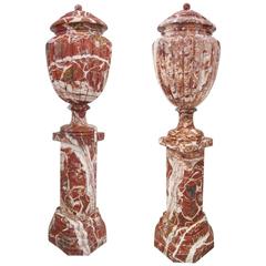 Monumental Pair of Breccia Marble Covered Urns on Pedestals