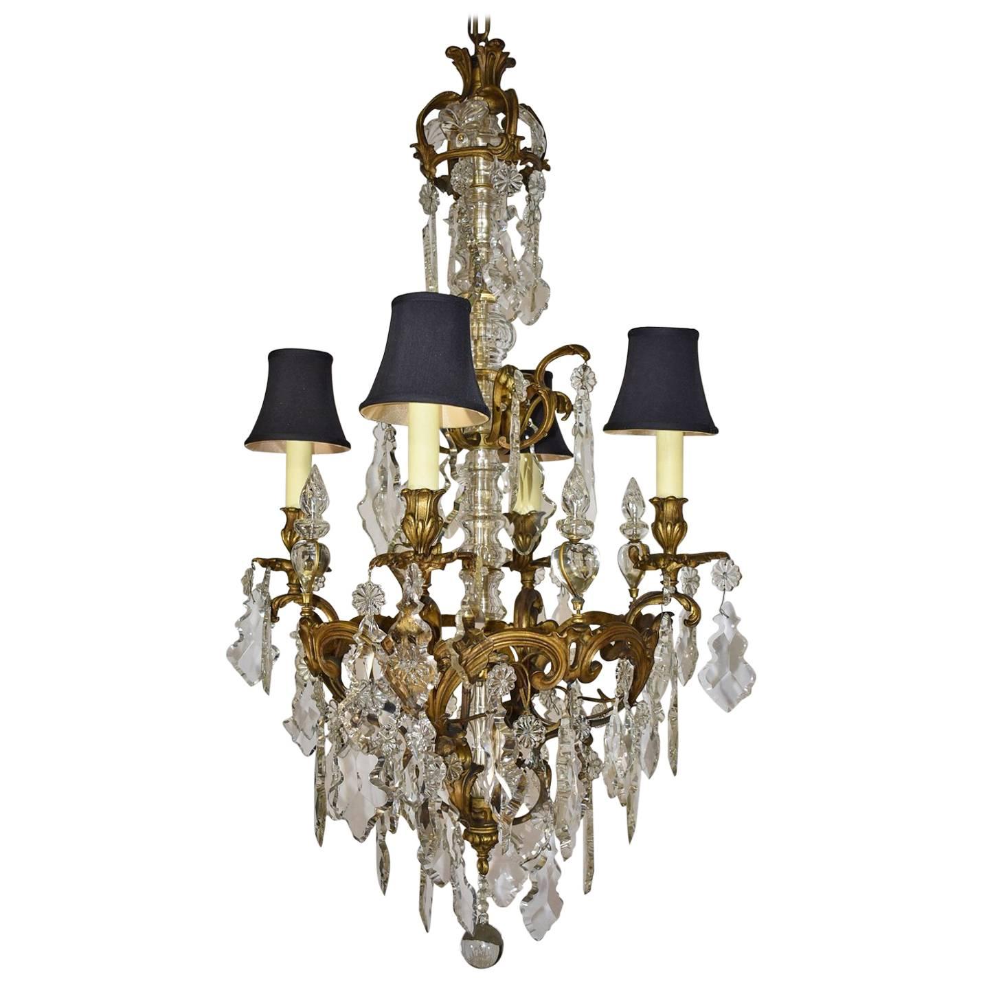 Large French Bronze Four-Arm Chandelier with Large Shaped Cut Crystals For Sale