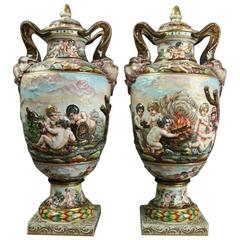 Pair of Italian Capodimonte Lidded Hand-Painted Porcelain Urns, 19th Century
