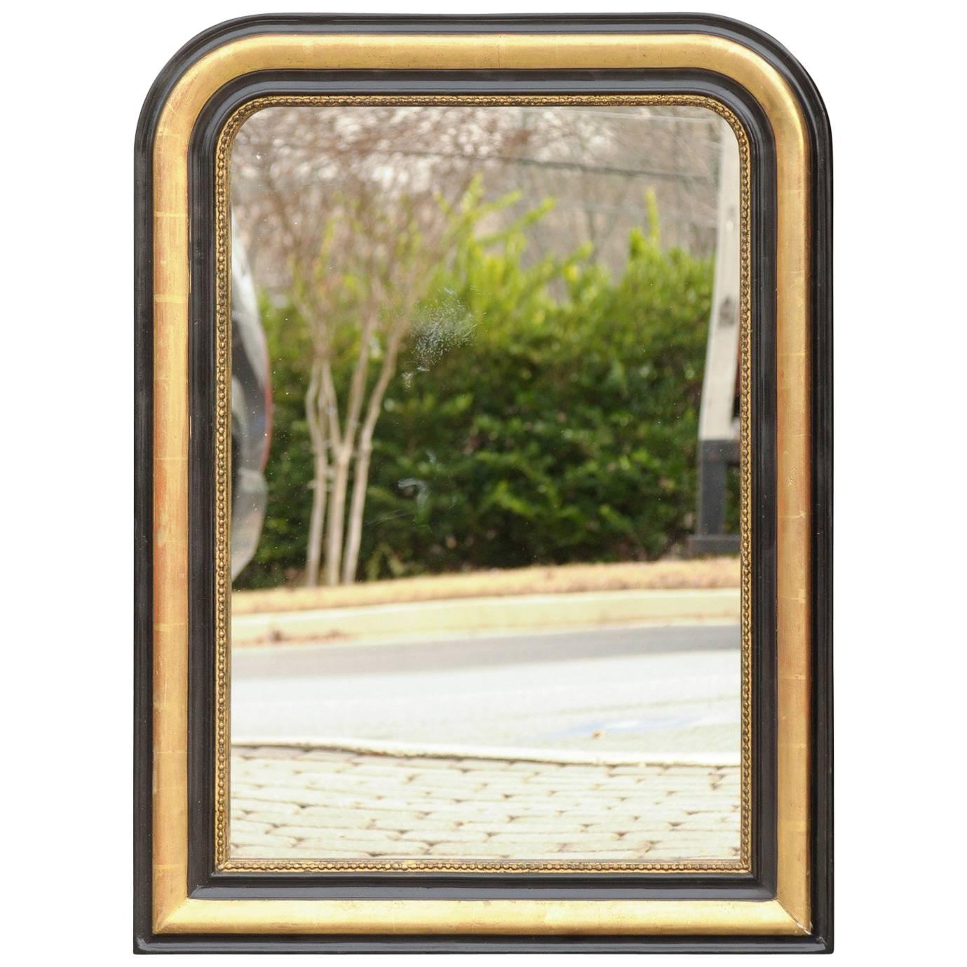 French Louis-Philippe Style Gilded and Ebonized Molded Mirror, circa 1900