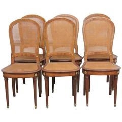 Six Directoire Style Caned Dining Chairs