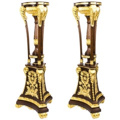 Pair of Mahogany Empire Style Giltwood Carved Torchers 20th C