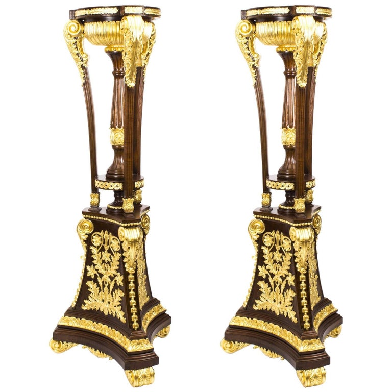 Pair of Mahogany Empire Style Giltwood Carved Torchers 20th C For Sale