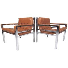 Pair of Mid-Century Modern Leather and Chrome Lounge Chairs