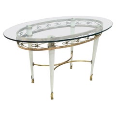 Retro Brass Coffee Table with an Oval Glass Top in the Style of Pierluigi Colli, Italy