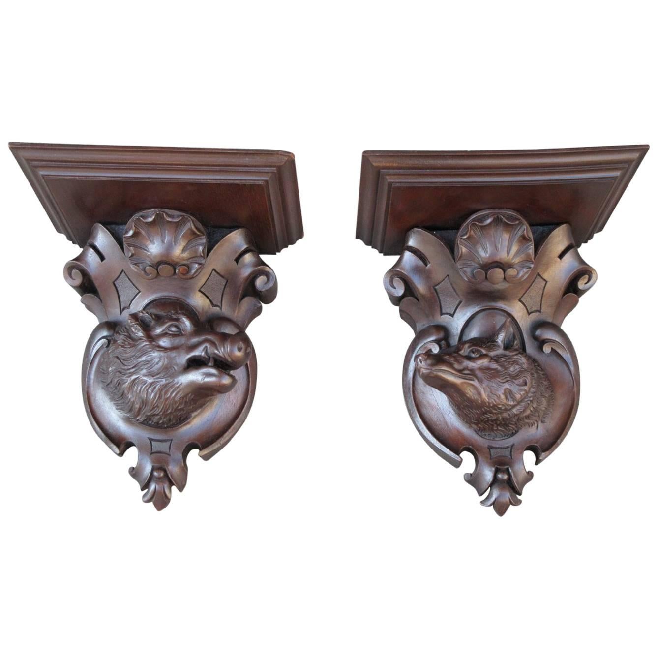 Pair of 19th Century German Black Forest Carved Walnut Wall Brackets