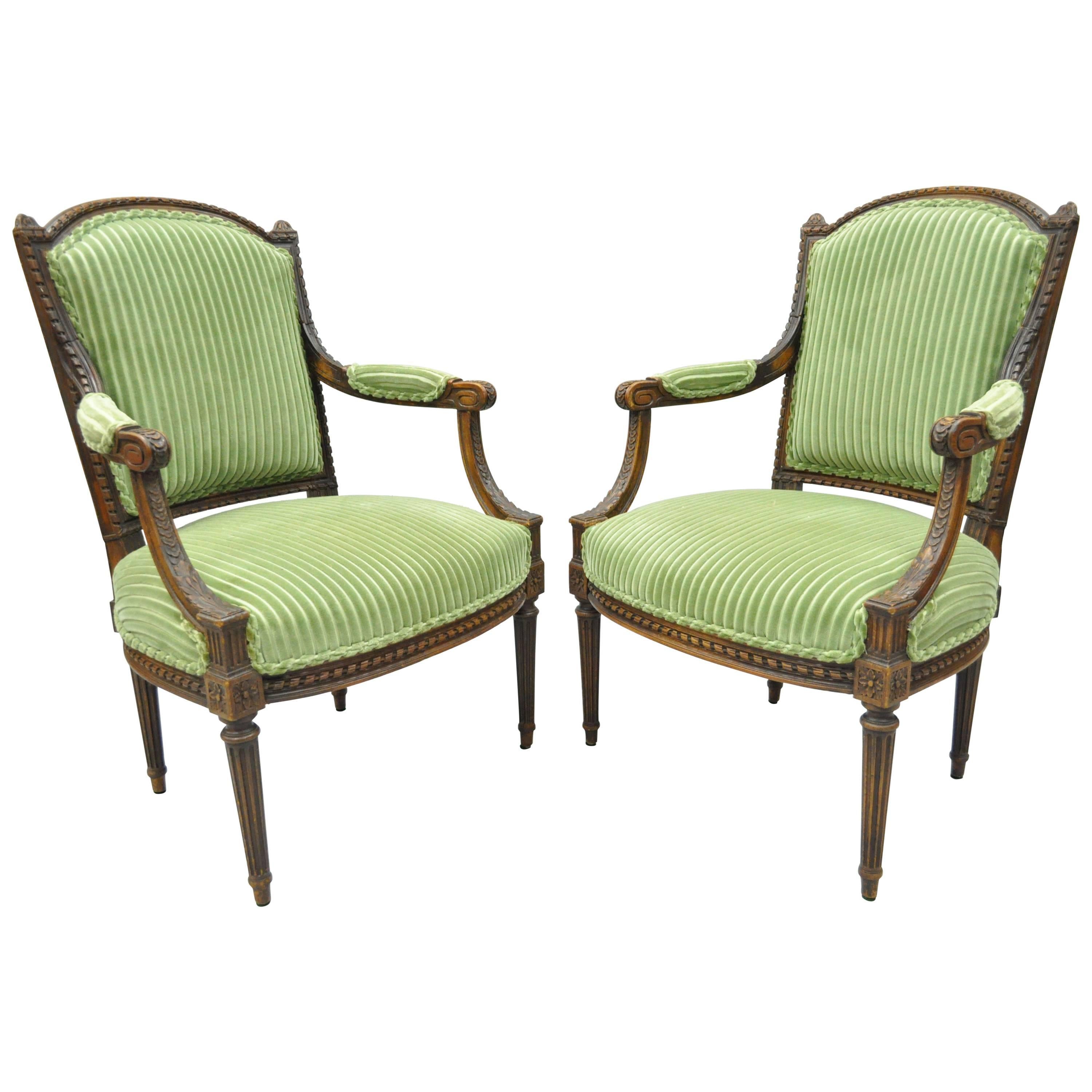 Pair of French Louix XVI Directoire Carved Walnut Green Fauteuil Arm Chairs