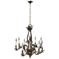 Oversized French Rococo Style Figural Bronze Nine-Light Chandelier