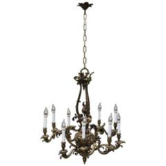 Oversized French Rococo Style Figural Bronze Nine-Light Chandelier 9