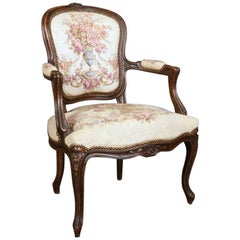 18th Century Carved French Beech Wood Louis XIV Fauteuil with Floral Tapestry