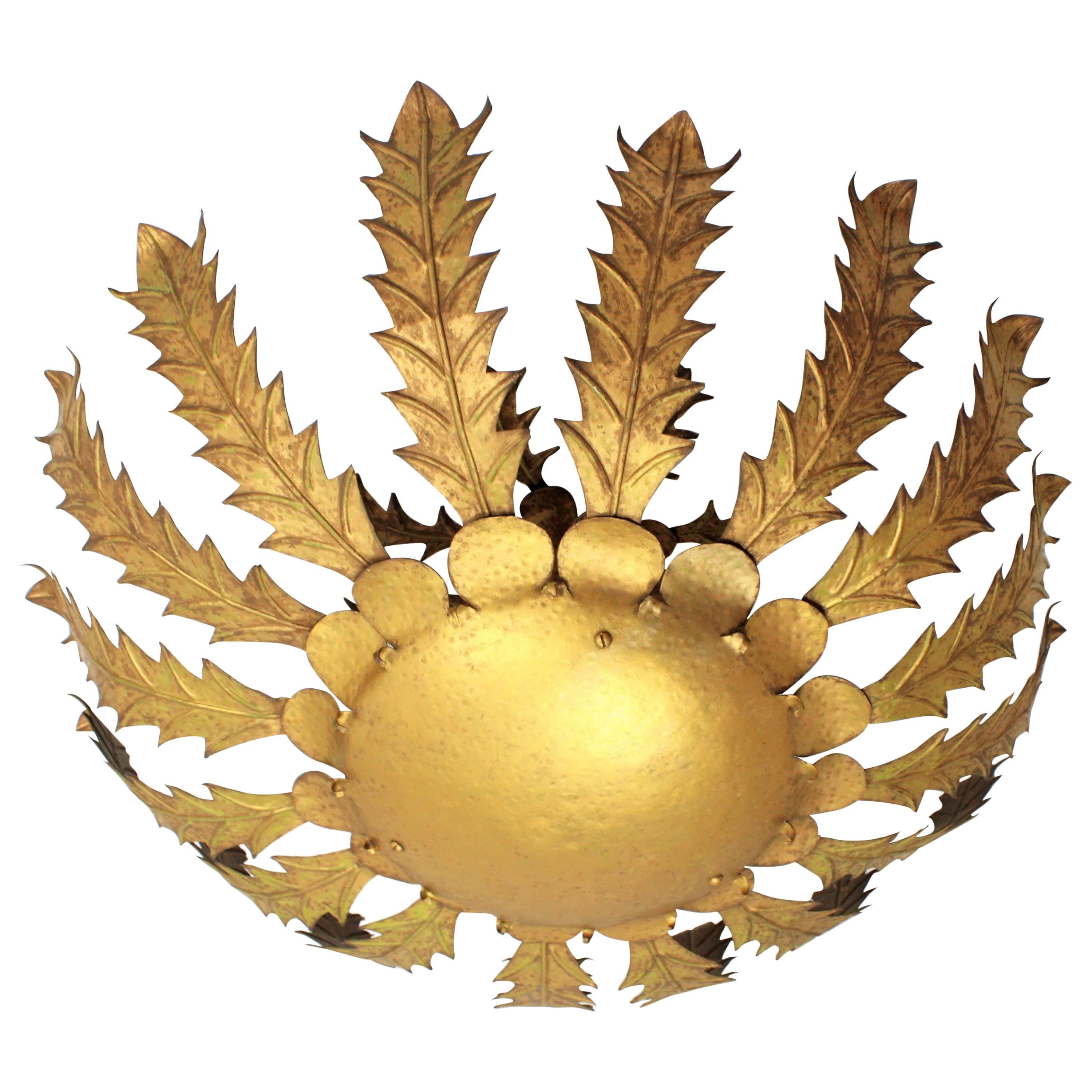 An spectacular 80 cm diameter hand-hammered iron flower burst flush mount from the Brutalist period. A central flower corolla framed by iron leaves make this ceiling lamp fixture highly decorative. Its large size makes the piece much more