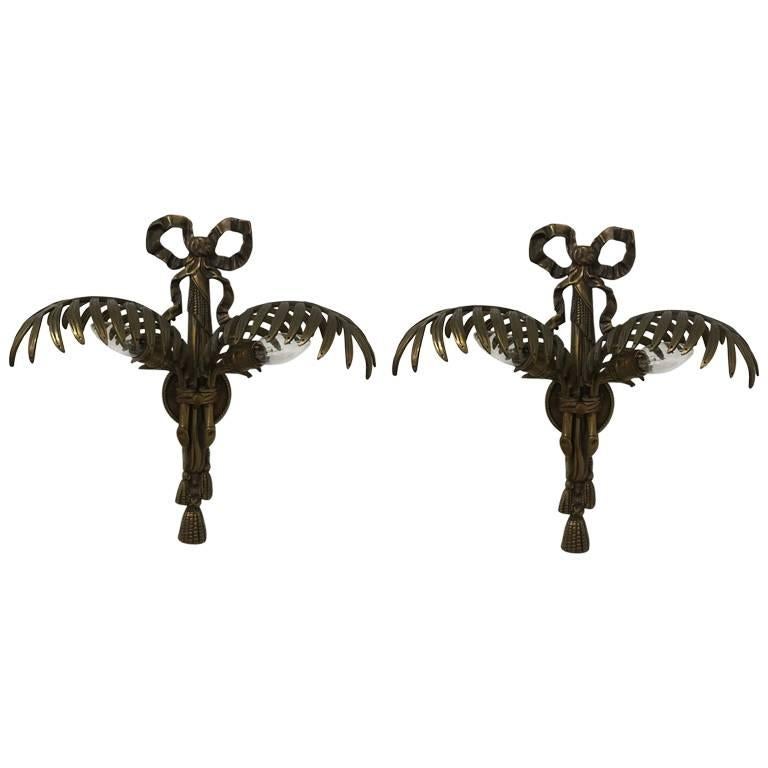 Pair of Hollywood Regency Brass Wall Sconces For Sale