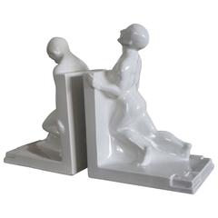 Pair of Glazed White Ceramic Art Deco Muscular Male Bookends