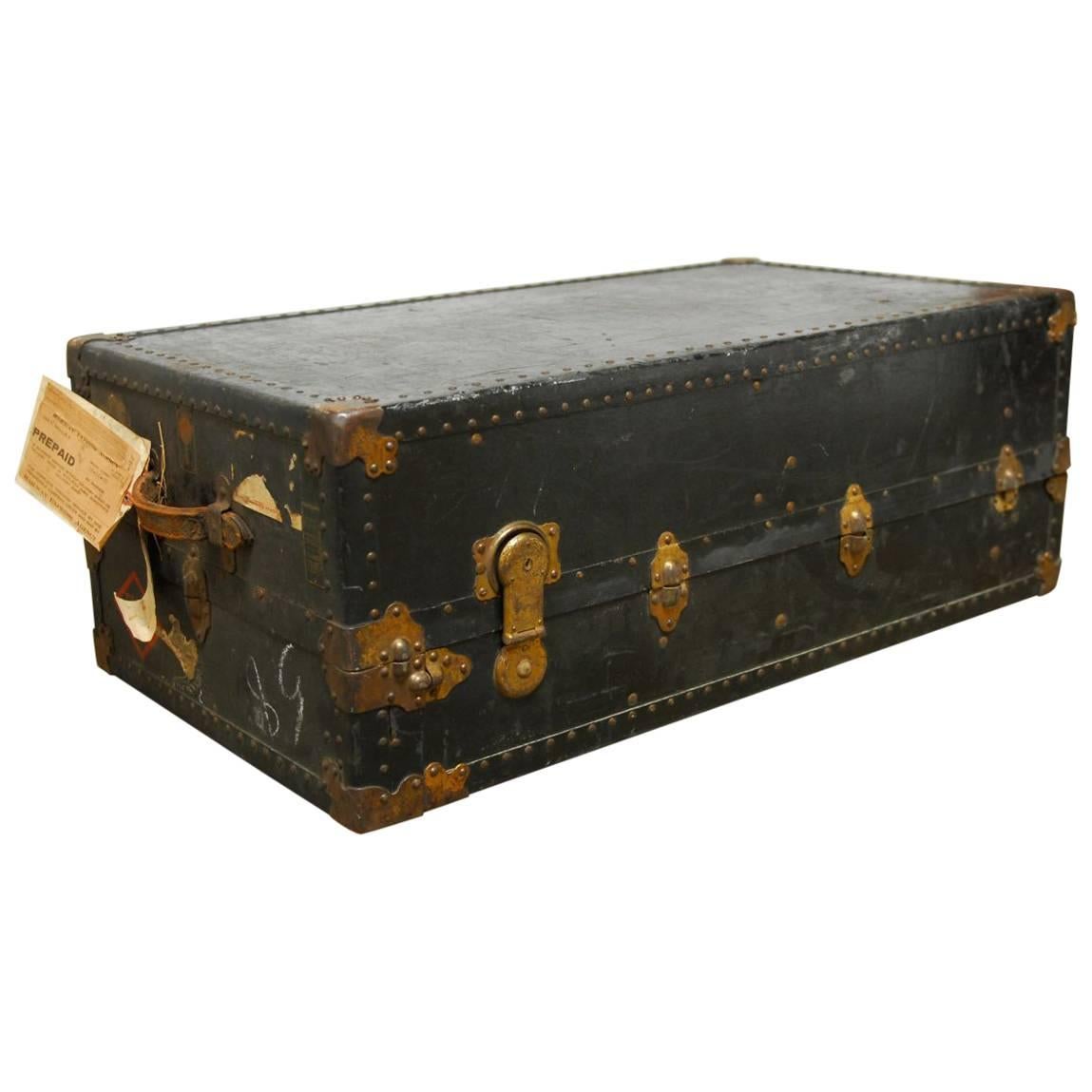 Lot - A large leather steamer trunk wardrobe, Oshkosh Trunks & Luggage