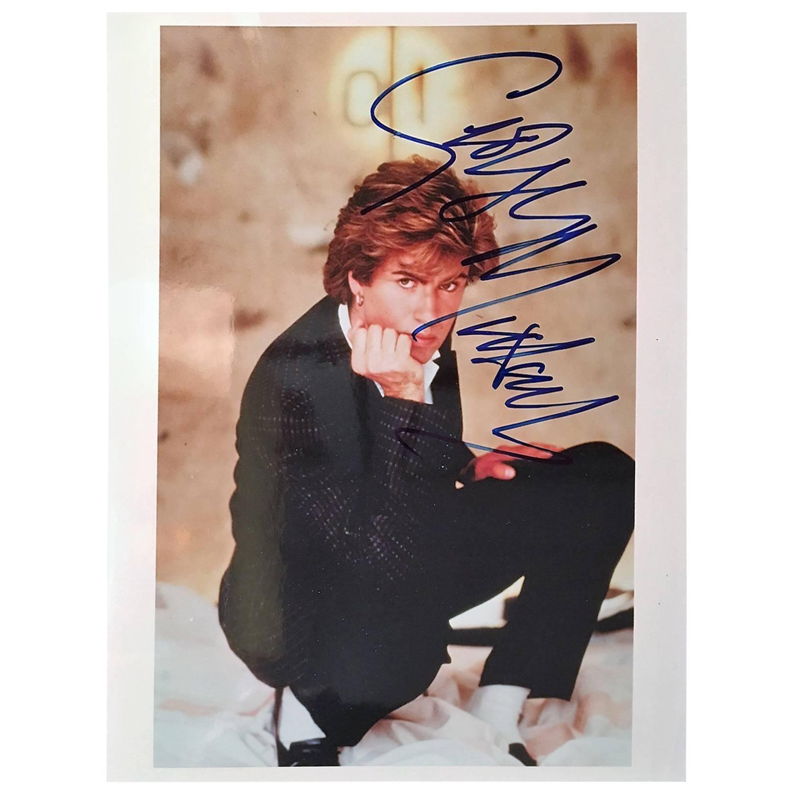 Two Autographed George Michael Photos For Sale