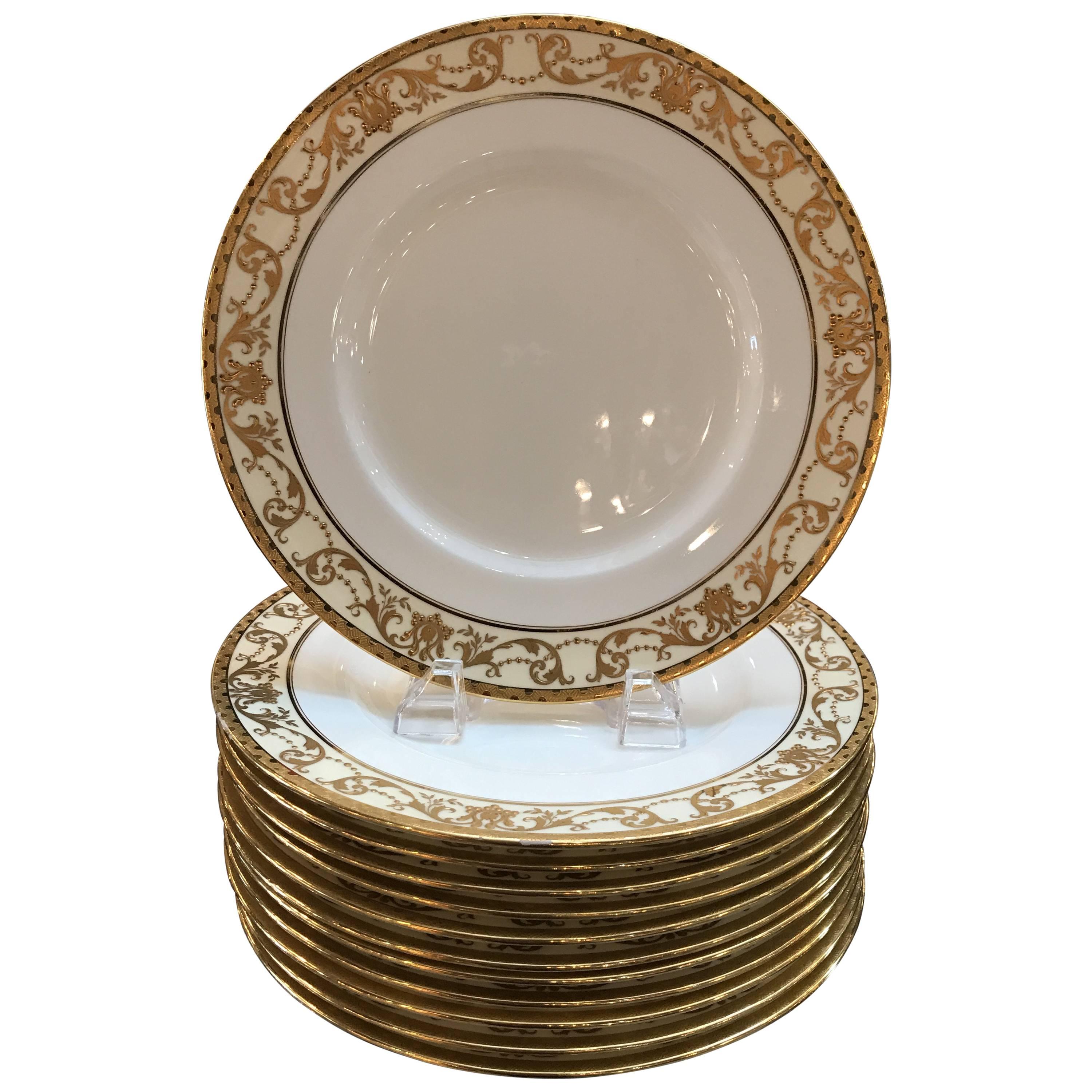 Set of 12 Gold Encrusted English Raised Gilt Service Plates