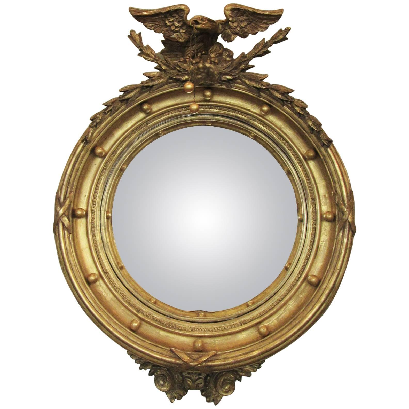 Early 19th Century English Regency Giltwood Convex Mirror with Eagle and Tassle