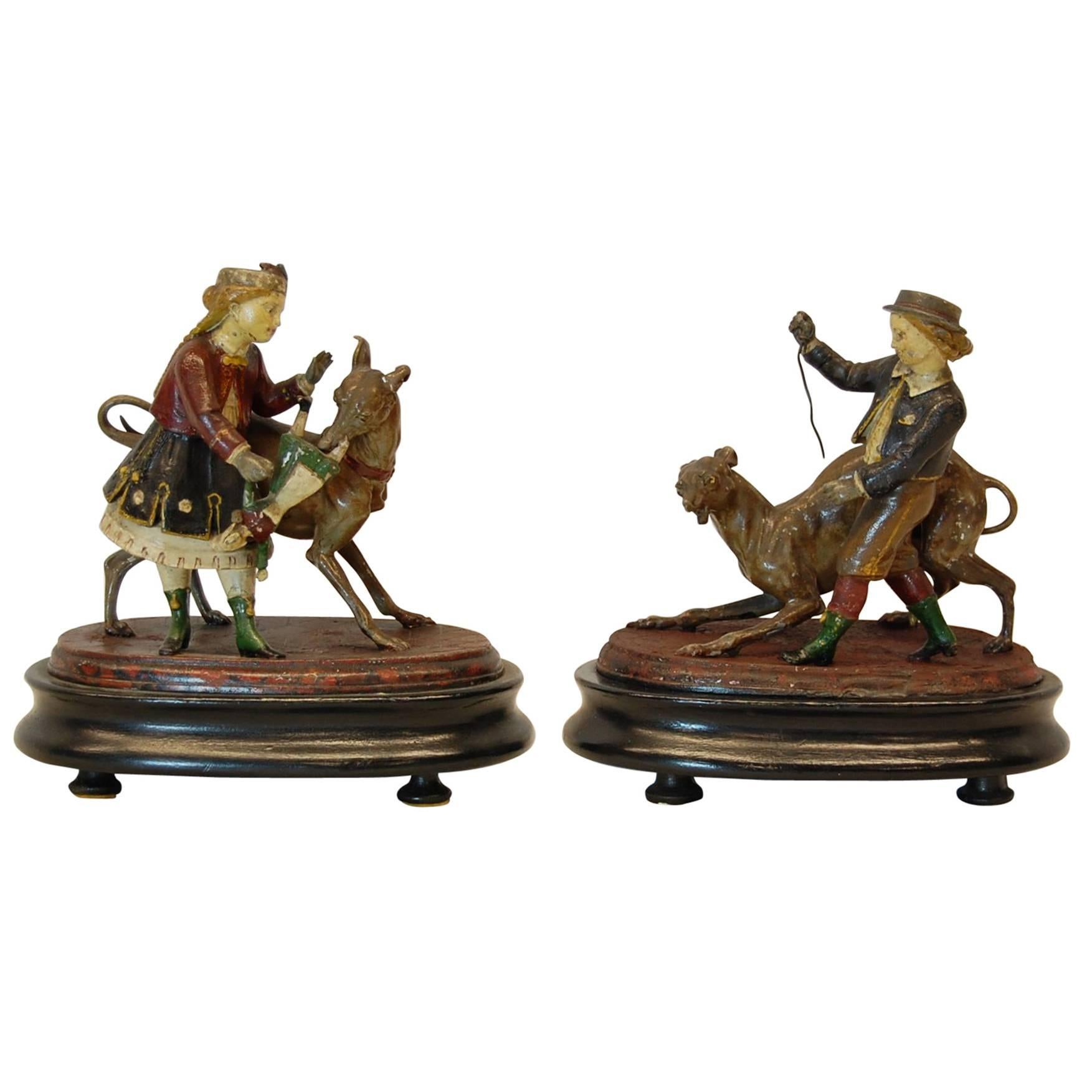 Pair of Metal Figurines Featuring Children and Their Dogs, circa 1890 For Sale