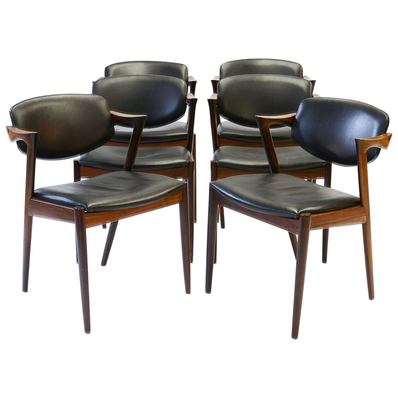 Six Kai Kristiansen 'Model 42' Dining Chairs in Rosewood & Black Saddle Leather