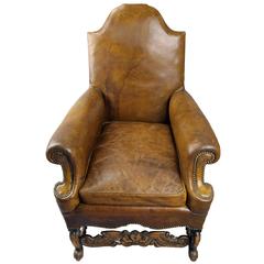 Antique 19th Century French Leather Library Chair with Primitive Carved Detailing