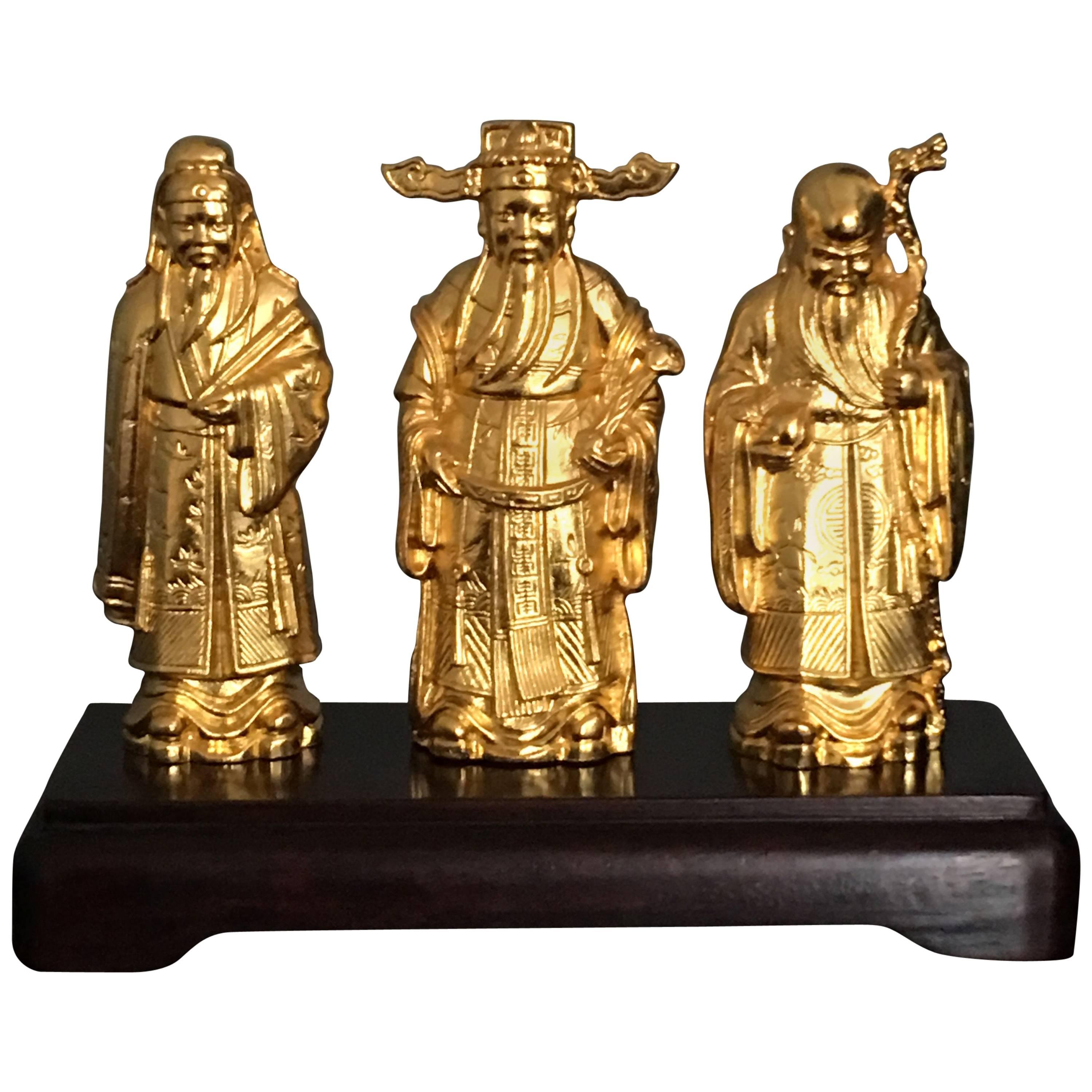 1970s Chinoiserie 24-Karat Gold Asian Emperor Statues on Stand, Set of Three