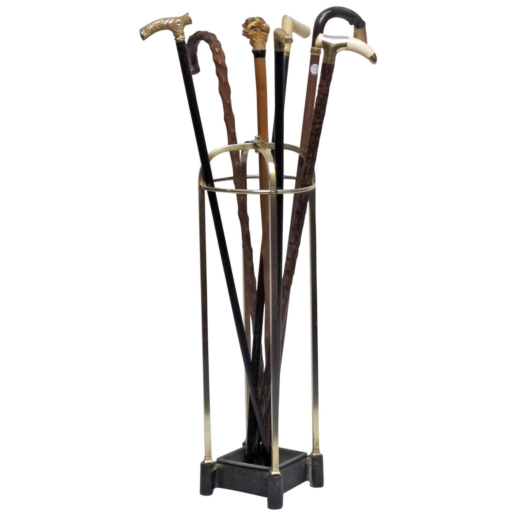 Brass and cast iron walking stick, cane or umbrella stand.