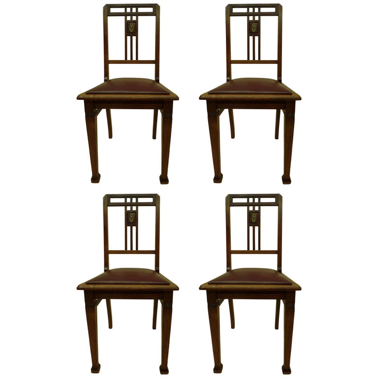 Four French Early Modernist Wood Dining Chairs with Inlaid Brass Grid