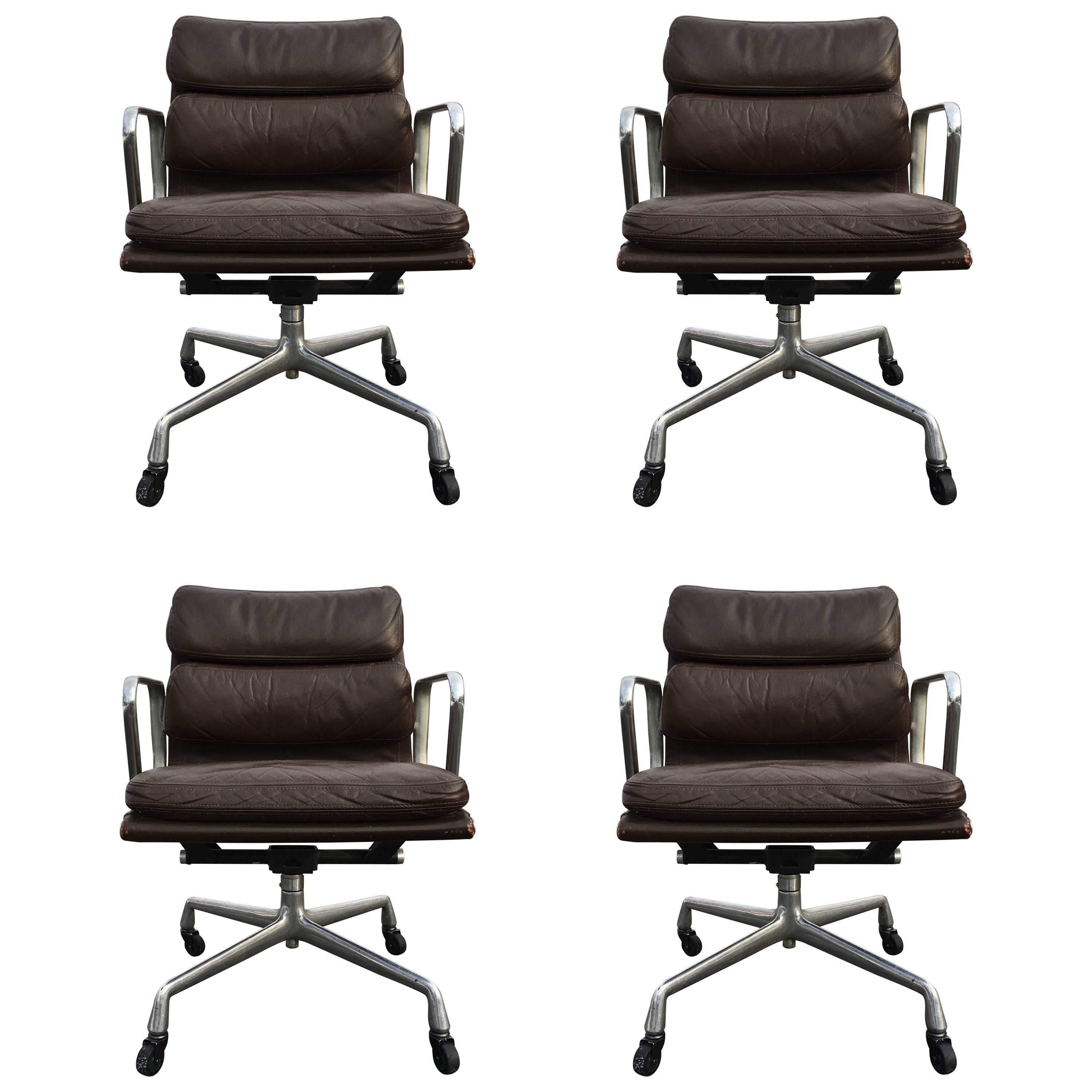 Four Herman Miller Eames Soft Pad Management Chairs