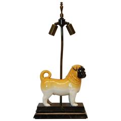 20th Century Porcelain Figure of a Pug Dog Resting on a Modern Wooden Base