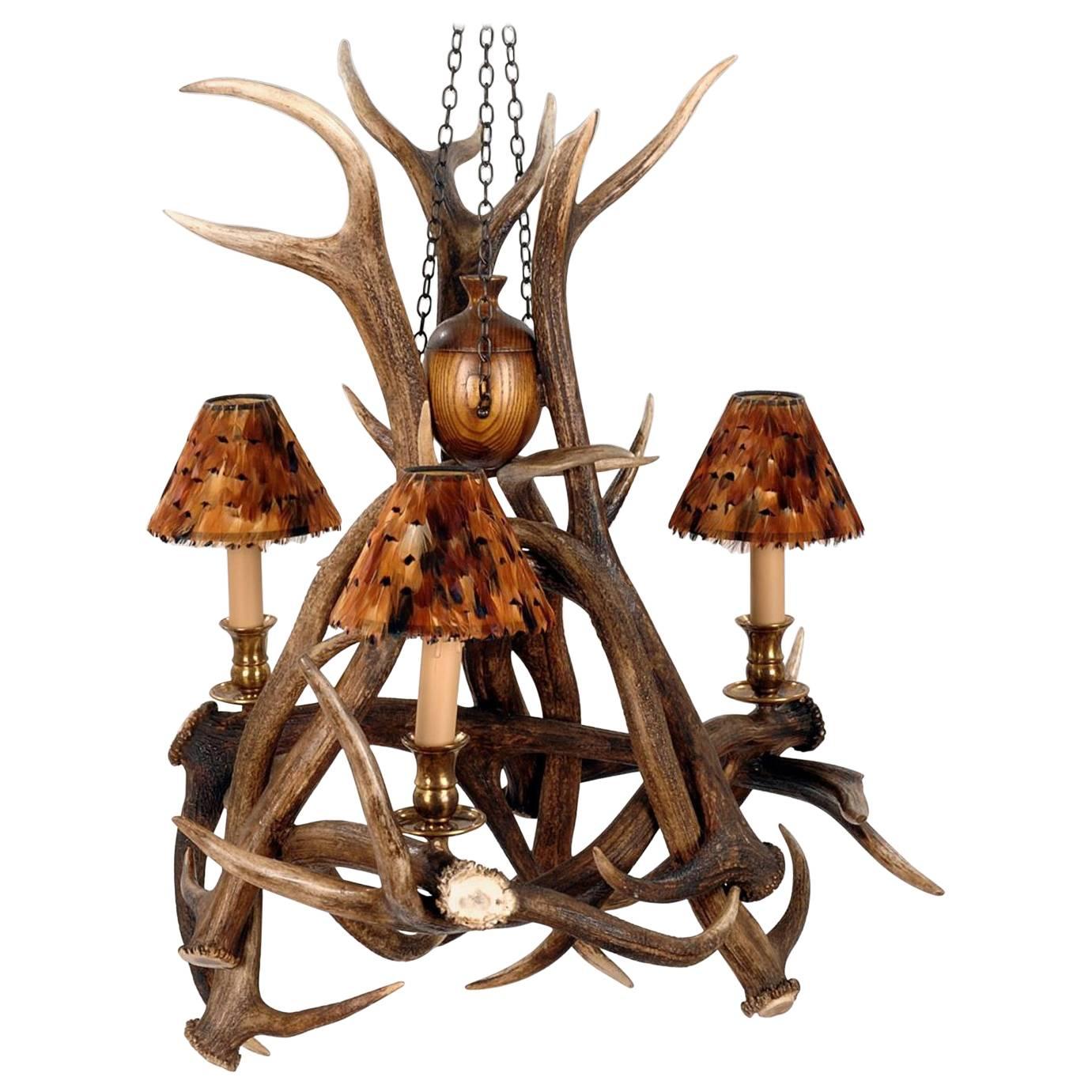 Three Antlers Chandelier, Vintage Brass Finish, Three Partridge Feather Shades For Sale