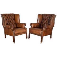 Pair of English George III Style Tufted Leather Wing Chairs