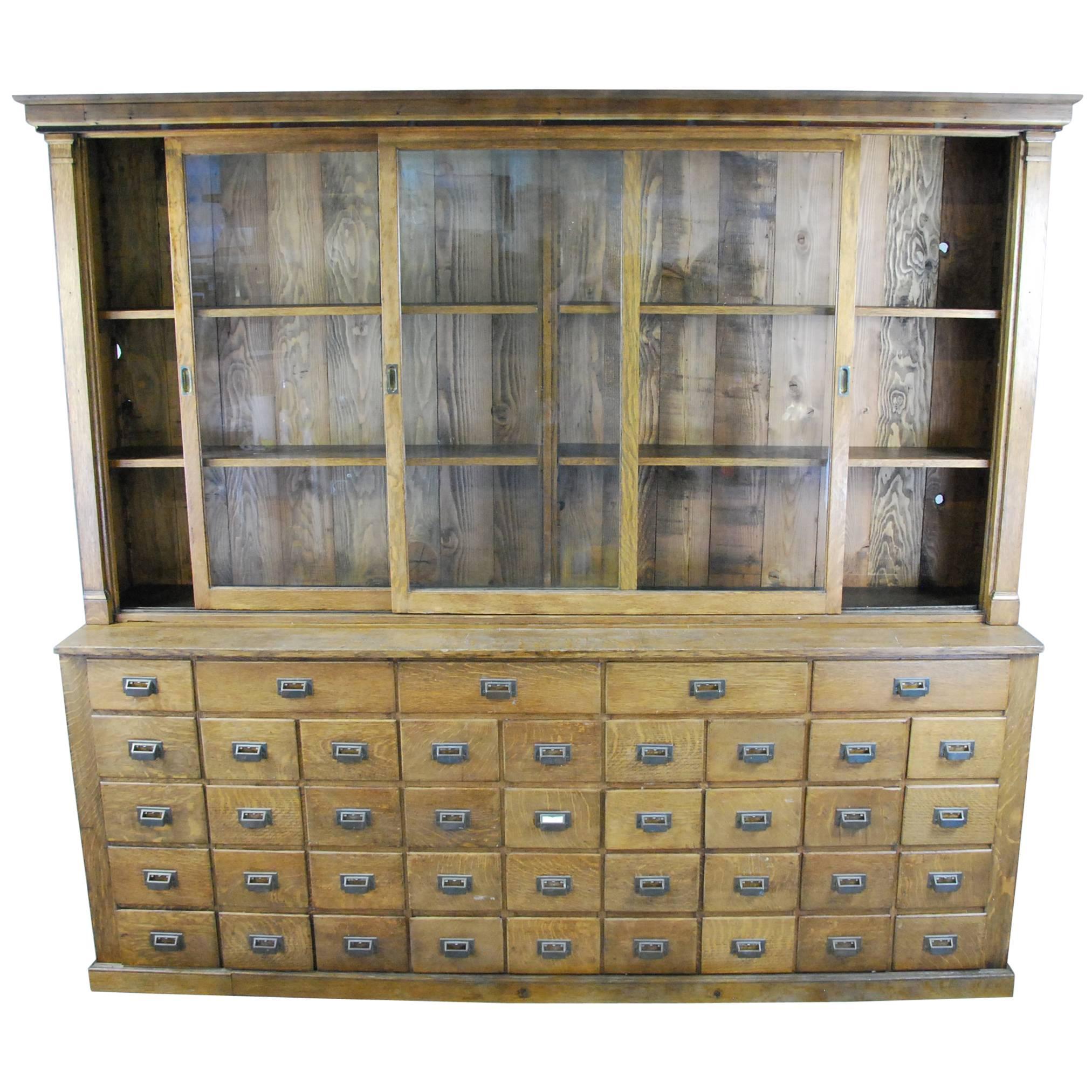 1900 Oak Mercantile Apothecary Cabinet