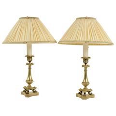 Pair of French Restauration Period Gilt-Bronze Candlestick Lamps, circa 1840