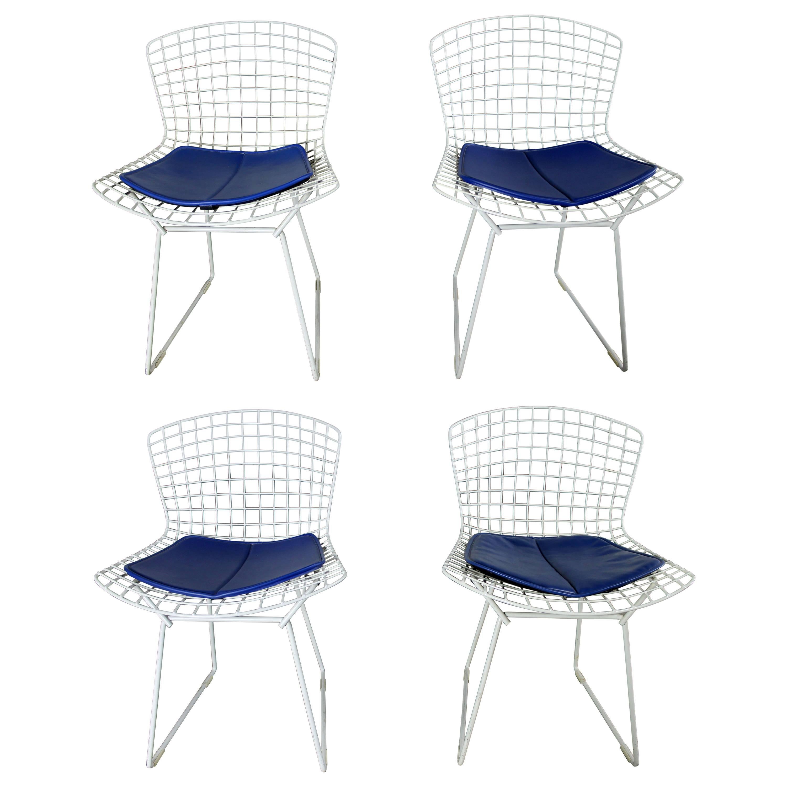 Four Mid-Century Modern Bertoia White Wire Side Chairs