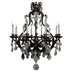 Large French Wrought Iron Gilt Bagues Rock Crystal Twelve-Light Chandelier