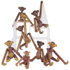 Mid-Century Modern Grouping of Teak Monkey Toys