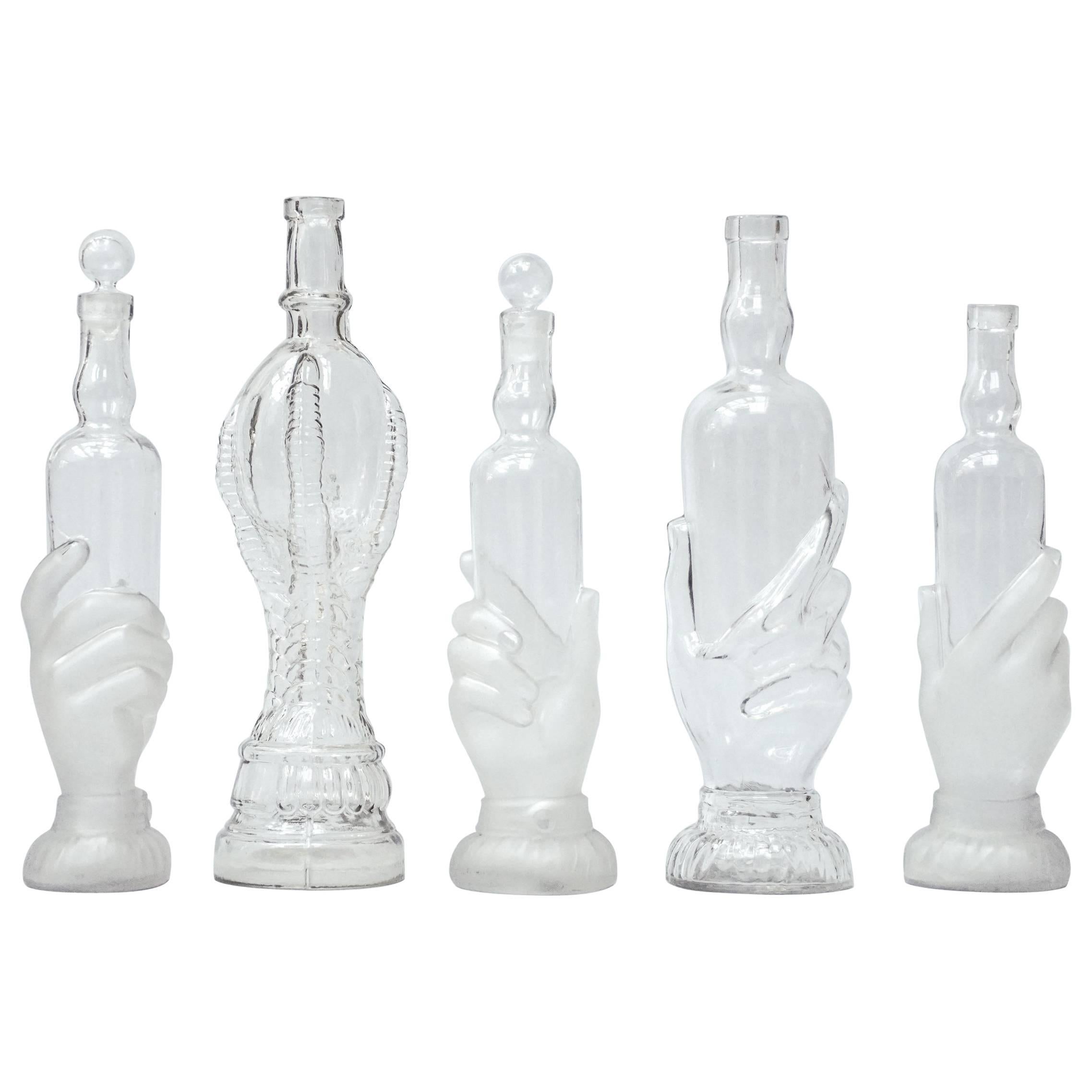 Five 19th Century Glass Bath Hand Shaped Soap Bottles